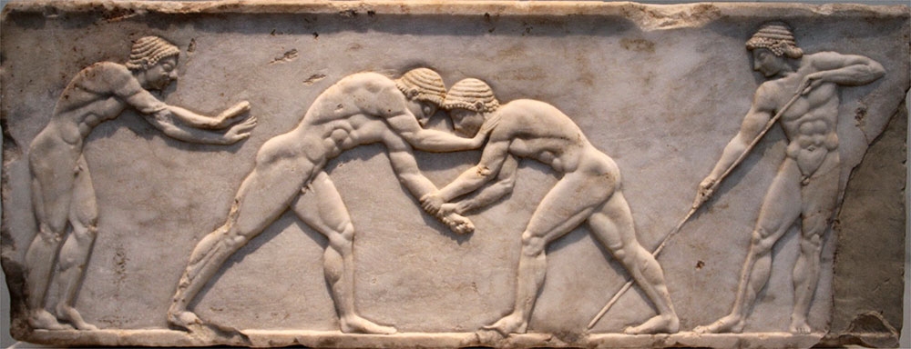 Изображение: «Борцы». Барельеф с афинского Акрополя. Ок. 500 г. до н. э. Мрамор. Национальный музей. Афины